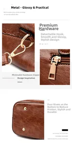Detailed view of gold hardware accents and bottom protective studs on brown leather bag
