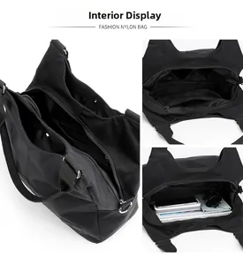 Detail view showing internal compartments and large capacity of black nylon tote bag