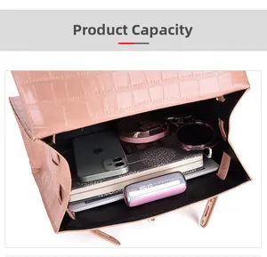 Pink embossed crocodile texture bag interior showing large capacity for daily items