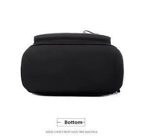 Detail view of the reinforced flat bottom of a black oxford fabric casual backpack