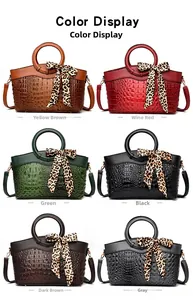 Multiple colors of crocodile pattern handbags with leopard scarf on round handles