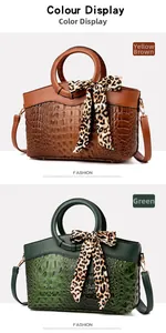 Detail of crocodile pattern handbags in yellow-brown and green with leopard scarf