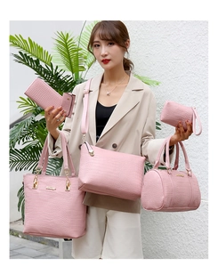 Outdoor shot of 5-piece pink crocodile embossed PU leather handbag set with gold hardware
