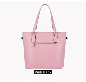 Pink tote bag back view showing crocodile pattern leather and metal zipper pocket