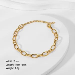 Detail of 18k gold plated 7mm link chain bracelet with adjustable lobster clasp