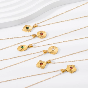 Elegant 18K gold plated titanium steel necklaces with radiant geometric pendants and zircons