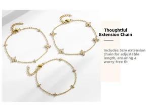 Detail view of adjustable lobster clasp and 5cm extension chain on gold clover bracelet