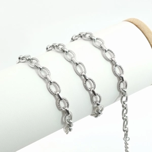 Close-up of hip hop stainless steel oval link chain with spiral twisted rope texture