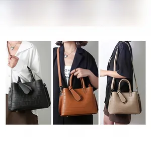 Three-way display of crocodile embossed tote bag showing handbag, shoulder, and crossbody styles