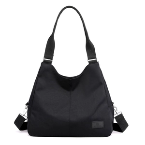 Black large capacity nylon tote bag with long straps and rubber brand logo by Suoyate