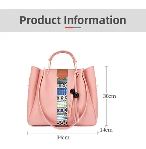 Sac seau en similicuir rose avec sangle géométrique et pompon, taille 34x30x14cm