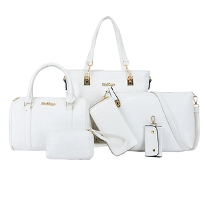 White crocodile pattern 6-piece handbag set with gold hardware on white background