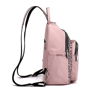 Pink Oxford cloth backpack for women with reflective geometric pattern and water resistant fabric