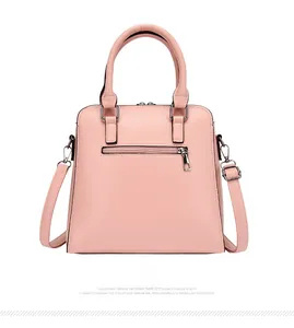 Pink PU leather tote bag back view showing functional zipper pocket and crossbody strap