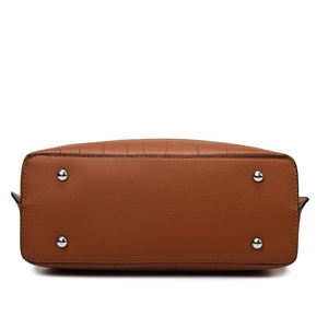 Bottom view of brown pebble leather tote bag showing four silver protective metal feet