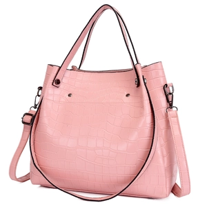Light pink crocodile pattern tote bag with top handles and adjustable shoulder strap