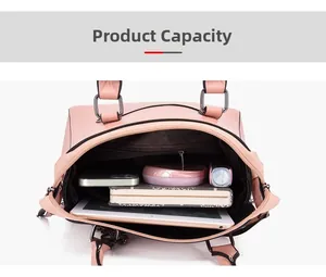 Internal view of pink handbag showing spacious main compartment and multi-pocket storage