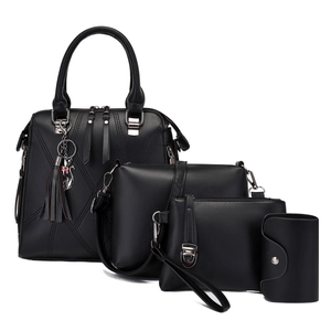 Black 4-piece women handbag set including tote and crossbody bag with cat tassel charm
