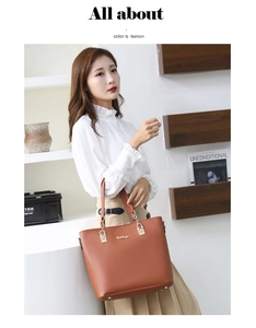 Sac cabas en cuir marron avec anses en chaîne dorée et tenue de bureau élégante