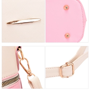 Detailed views of the tri-color handbag's gold-tone hardware and cross-grain leather texture