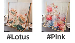 Detail view of lotus and pink floral prints on lightweight summer silk scarves