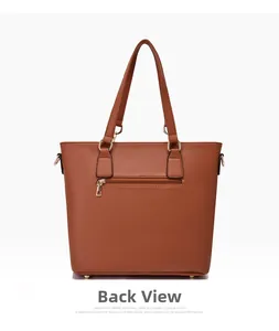 Vue arrière du sac cabas en cuir cognac avec poche zippée et détails métalliques dorés