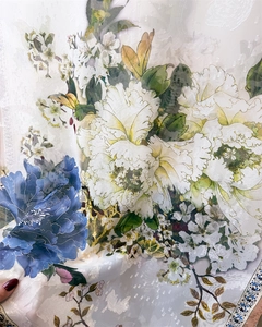 Detailed view of floral peony print on premium lightweight silk scarf fabric