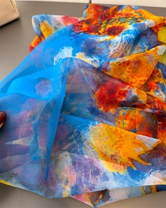 Macro detail of sunflower oil painting print on lightweight semi-transparent silk scarf
