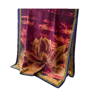 Elegant silk scarf featuring blue lotus floral print and traditional geometric border
