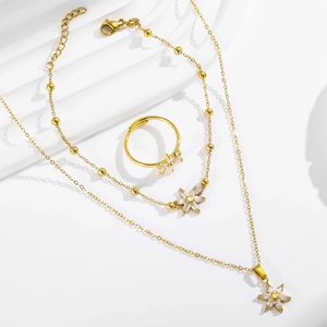 Parure de bijoux en acier doré avec collier fleur, bracelet et bague pour femme