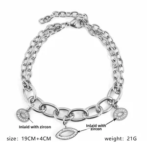 Detail of silver chain bracelet with zircon charms, 19cm length and lobster clasp