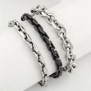Three-piece stainless steel bracelet set for men featuring vintage industrial chain links