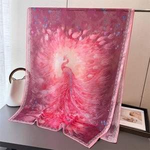 Detailed pattern of fuchsia phoenix print on elegant lightweight silk scarf for women