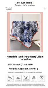 Detail van blauwe pied-de-poule polyester sjaal met oranje randen en productspecificaties