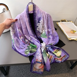 Elegant purple floral print scarf in lightweight fabric with high-quality drape