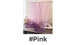Detailed macro view of gradient pink to purple silk scarf with white floral print