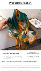 Detail of 185x120cm printed floral scarf with white lotus pattern and orange border