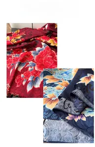 Detailed view of luxury silk scarf featuring traditional peony floral print patterns