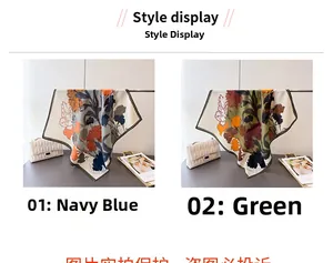 Detail view of retro floral cotton-linen scarves with navy blue and olive green prints
