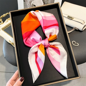 Silk-like square scarf with bright colorful stripes and elegant bowtie knot