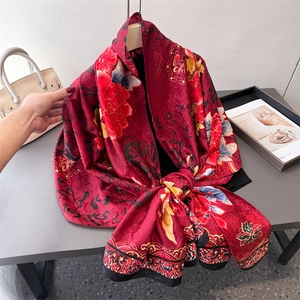 Elegant red silk scarf with golden peony floral print and Chinese calligraphy design