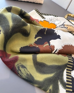 Detail of floral linen-feel square scarf with botanical print and classic striped edge