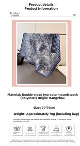 Detail view of double-sided polyester scarf with herringbone weave and forest print
