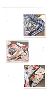 Detail of herringbone silk scarf with animal print and floral pattern borders