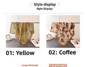 Detail of silk square scarves featuring yellow leaf and brown butterfly patterns