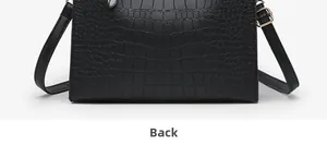 Detail view of the back side of a black crocodile-patterned bucket shoulder bag for women