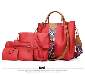 Detail view of 4-piece red pebbled PU leather bag set with colorful geometric straps