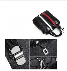 Detail of black leather backpack featuring red and white stripes with silver hardware