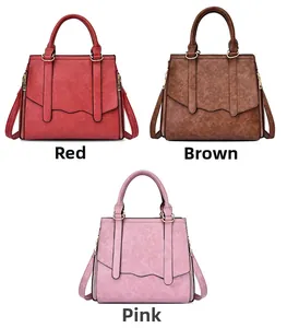 Detailed comparison of large vintage shoulder bags in red, brown, and pink PU leather