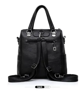 Back view of a black pebbled leather backpack with adjustable straps and rear zipper pocket